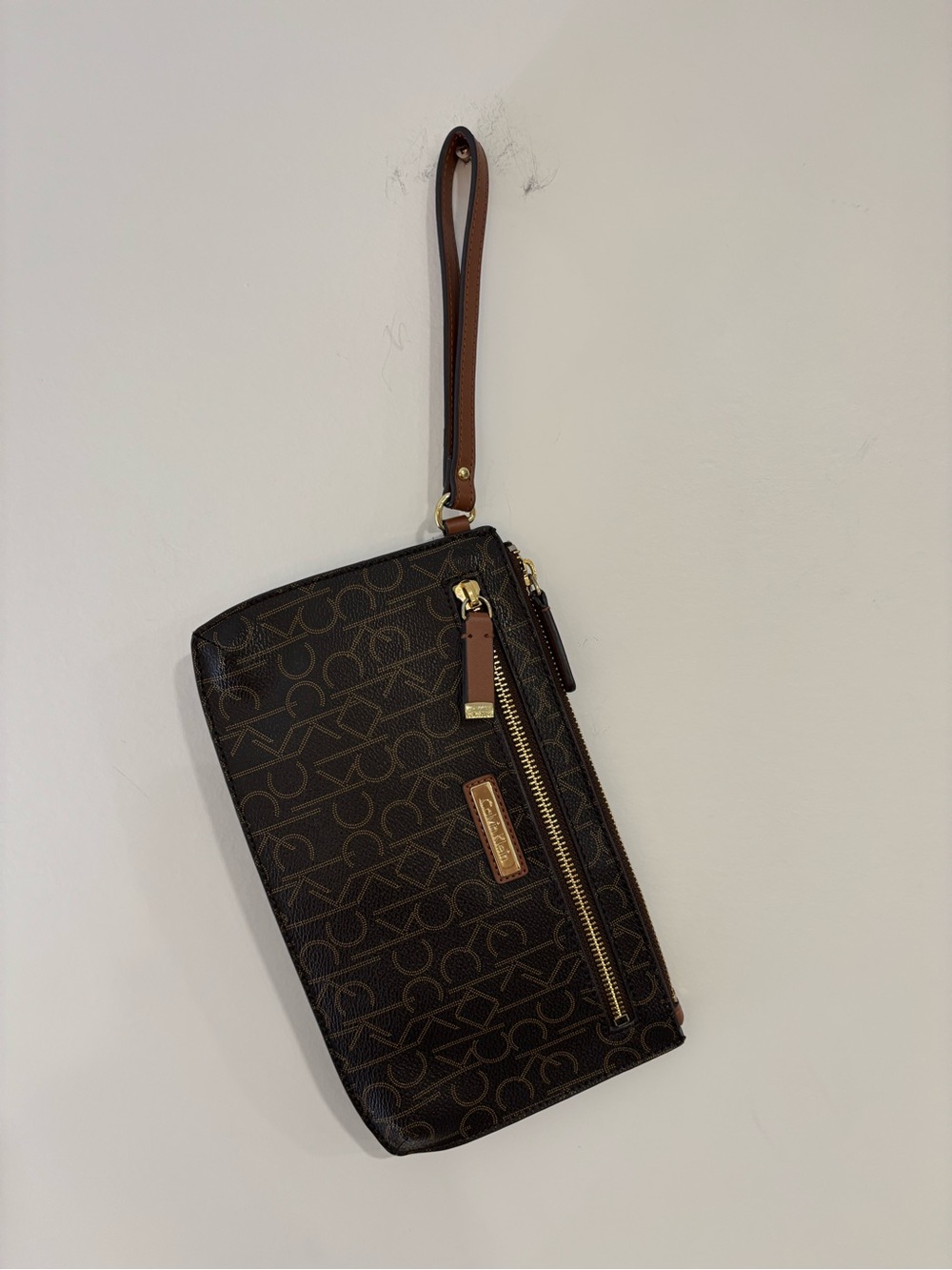 Calvin Klein Dark Brown Monogram Wristlet Clutch with Gold Accents